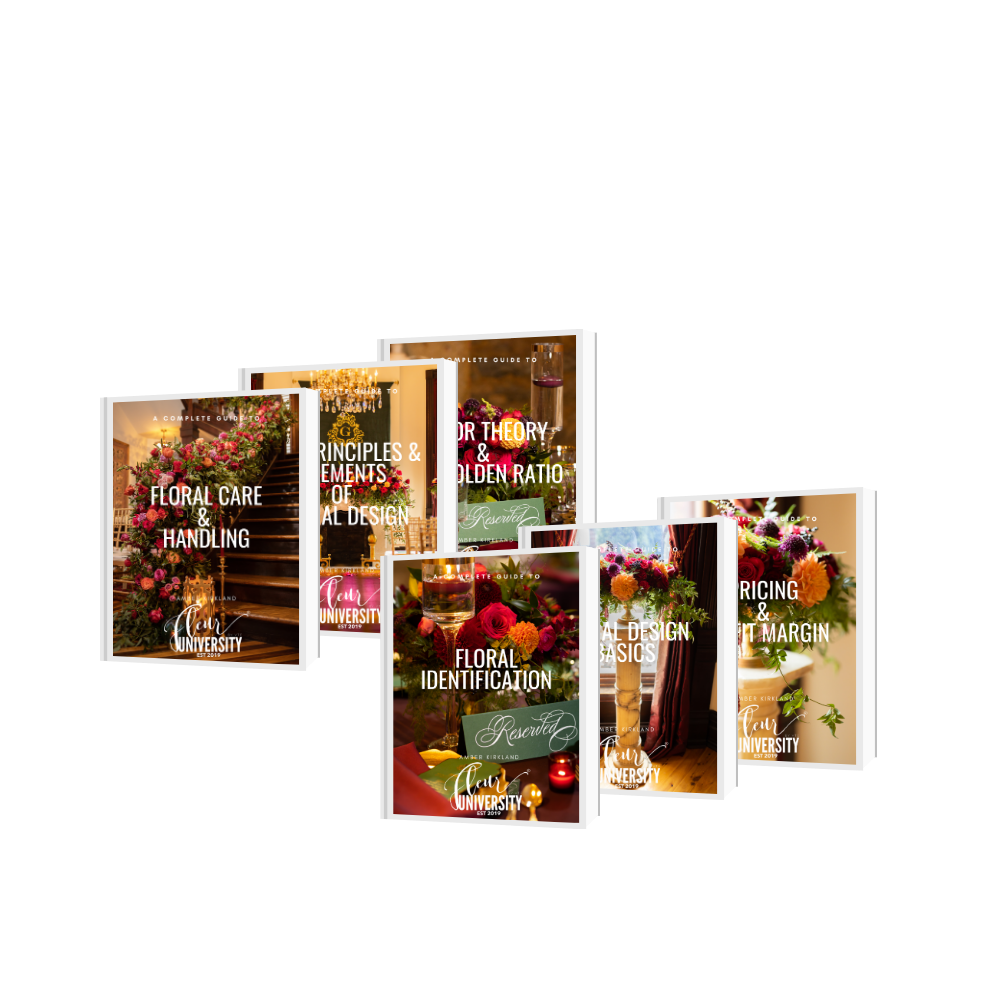 Collection of floral design books on a white background