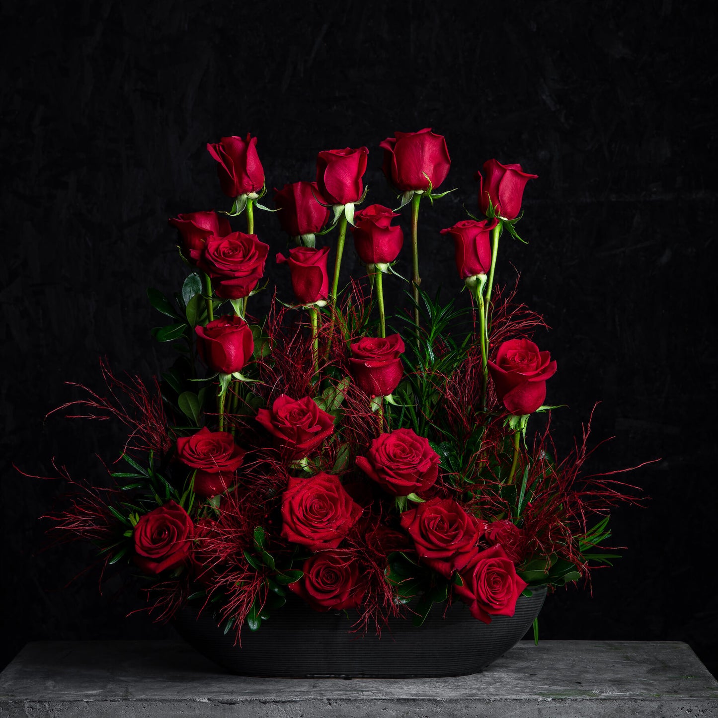 Bouquet of red roses with dark background