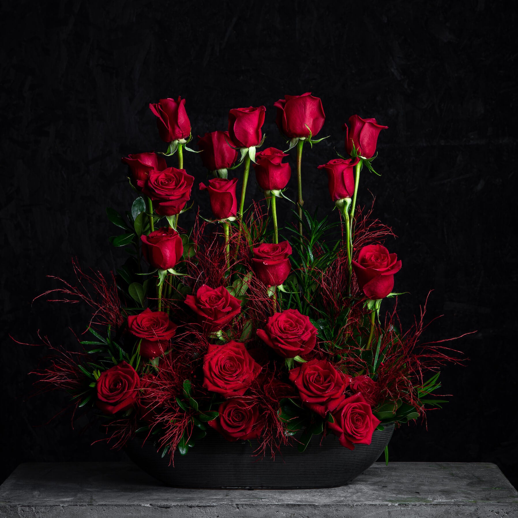 Bouquet of red roses with dark background